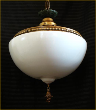 Title: 1920 Vancouver Island Light Fixture - Description: Large milk glass tasseled shade on this antique brass pendant with green accents, marked 1920.